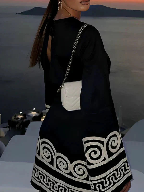 Yara | Elegante jurk met geborduurde print