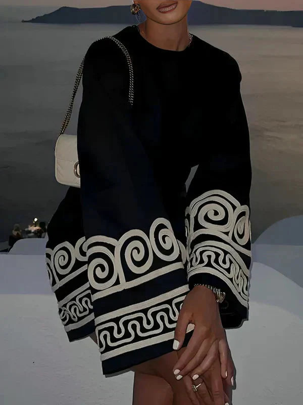 Yara | Elegante jurk met geborduurde print