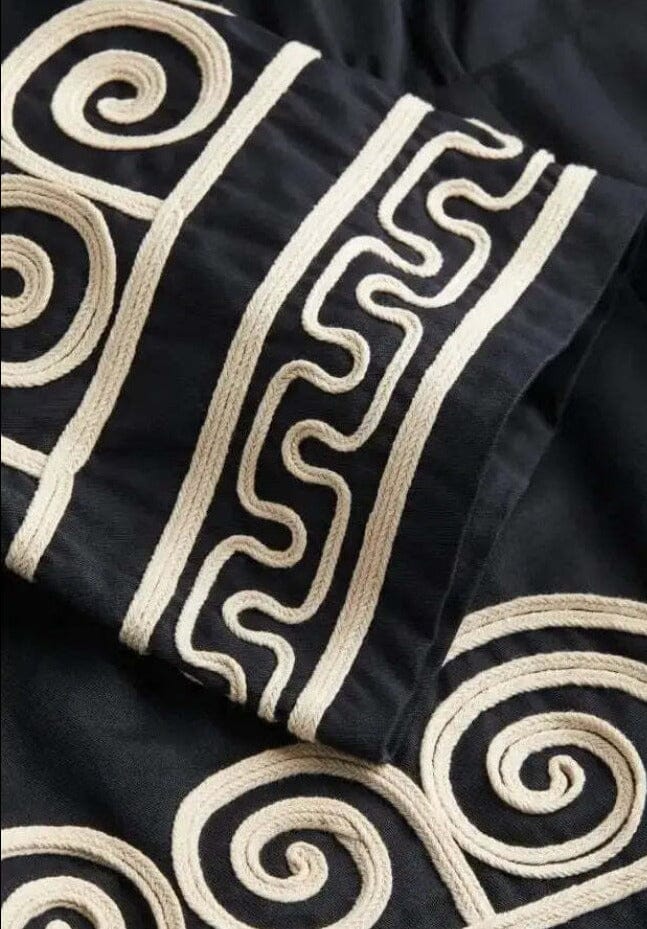 Yara | Elegante jurk met geborduurde print